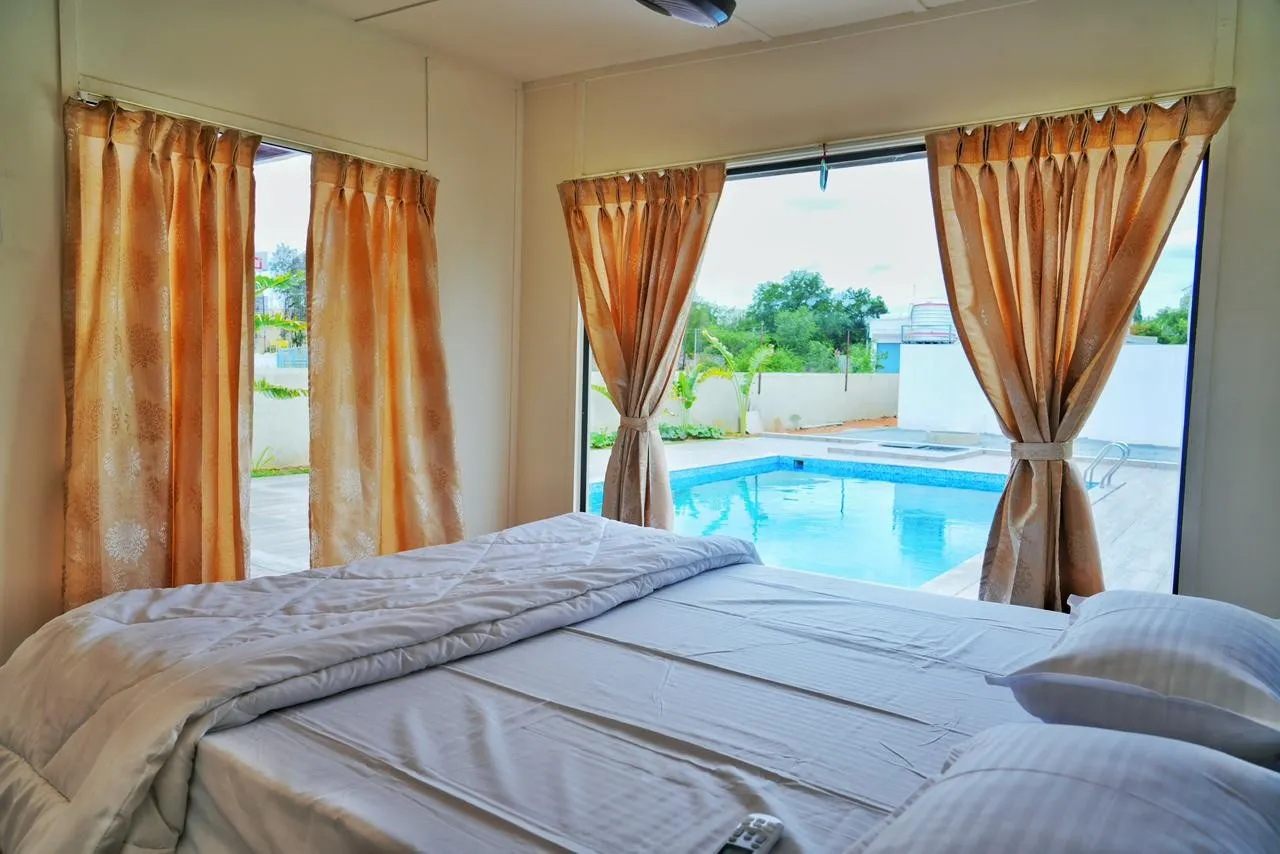 Bedroom at Marvel Farm Stay, Moinabad