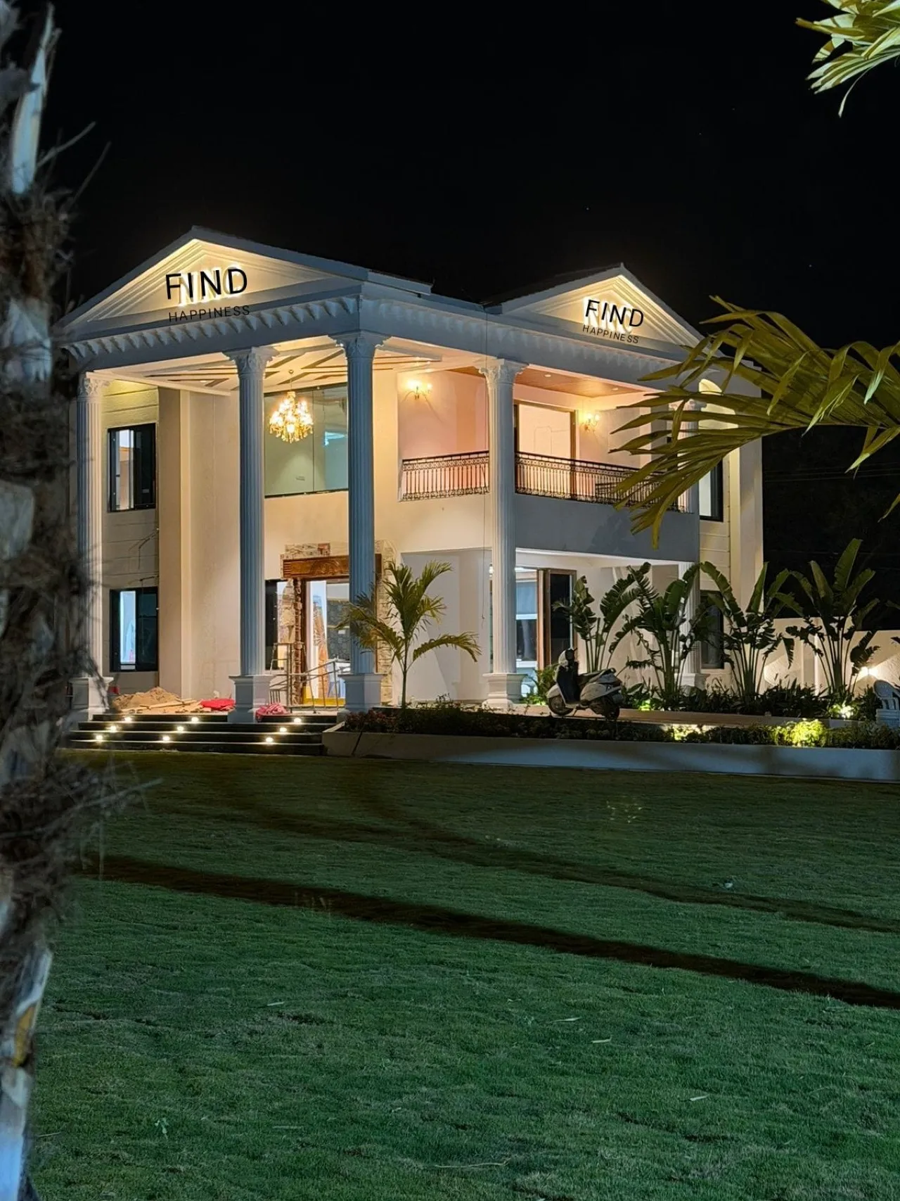 The farmhouse at night at Find Happiness Farm house, Moinabad