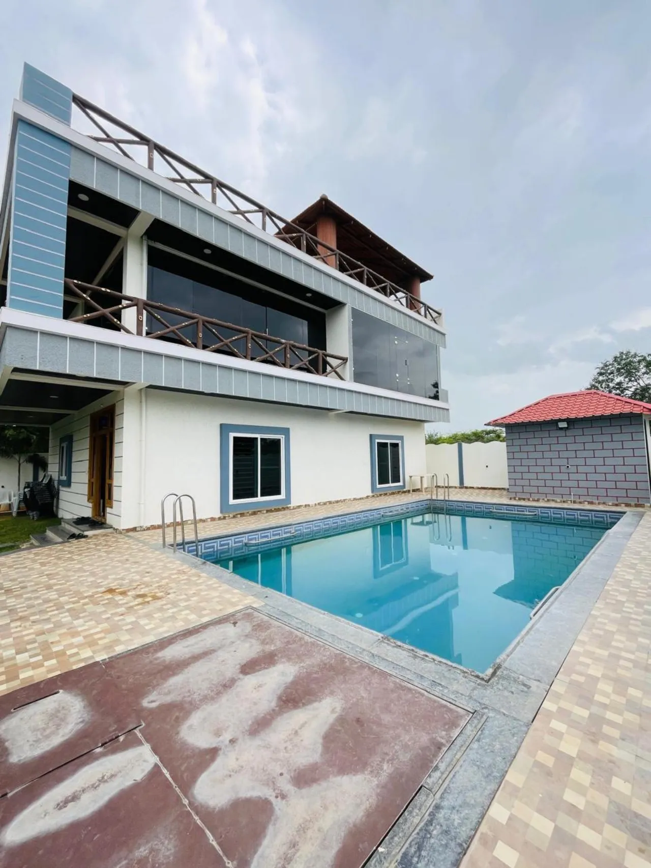 Private swimming pool at Rocklyn Farmhouse, Venkatapur, Moinabad