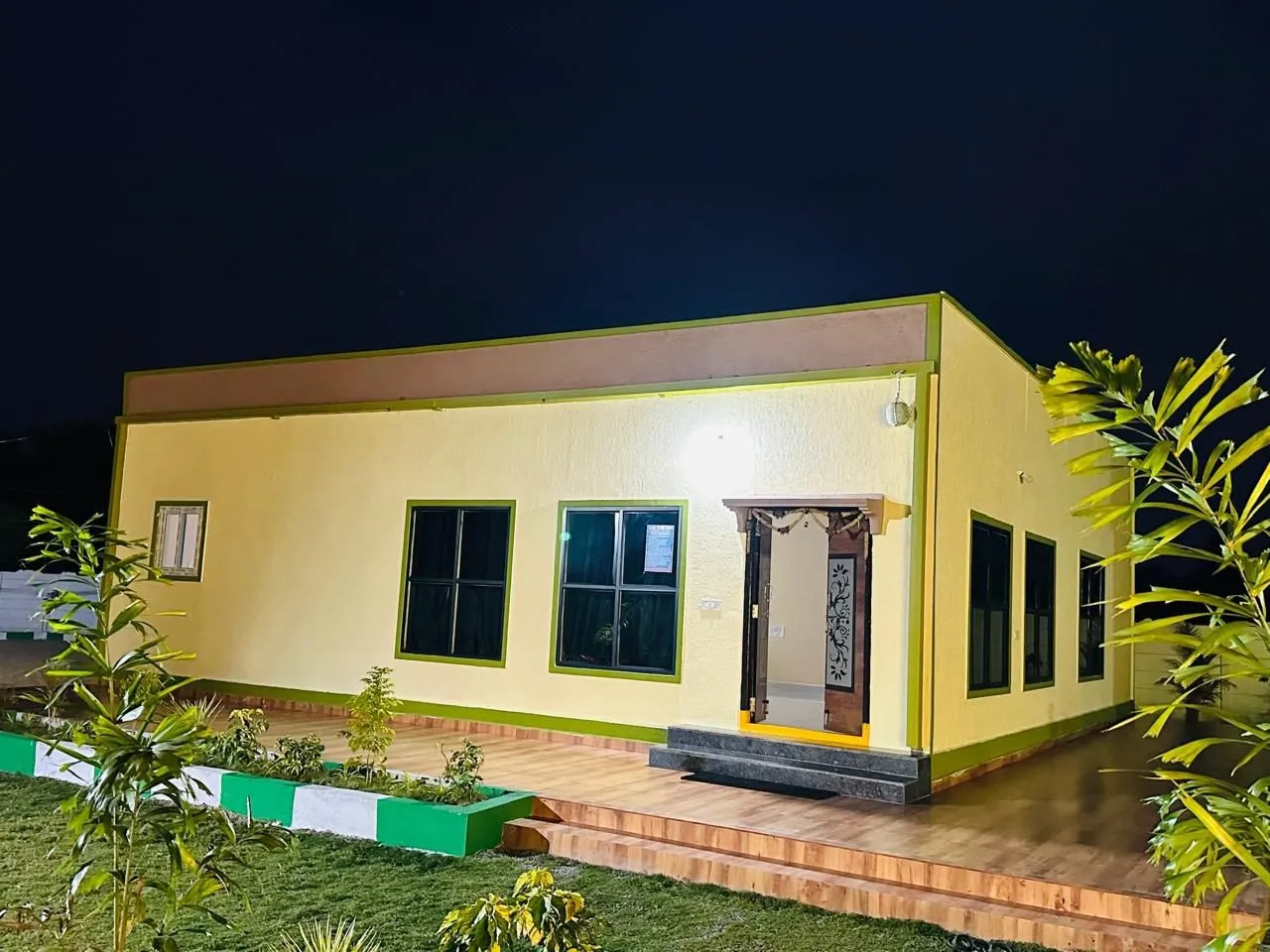 The farmhouse at night at R A S Farmhouse, Moinabad